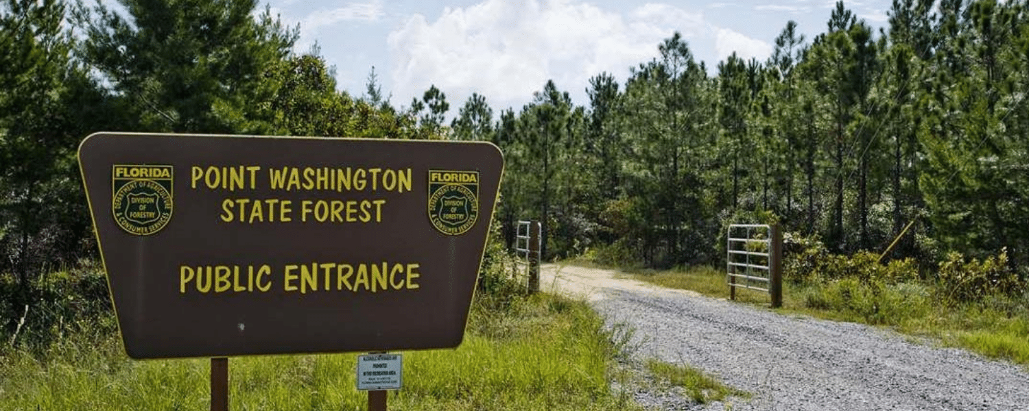 Sign pointing to Point Washington State Forest