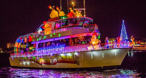 Yacht decked out with Christmas lights for the Harbor Destin Boat Parade